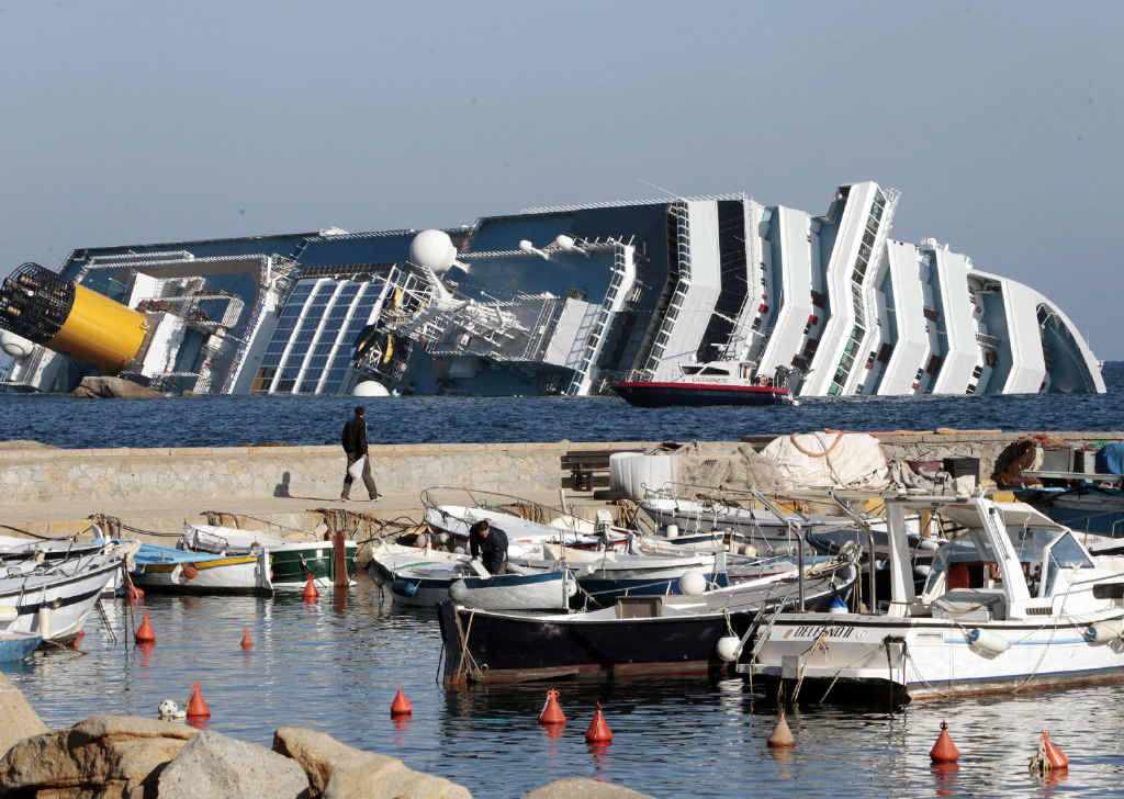 A view of the stricken Costa Concordia as crews attempt to raise the sunken ship. A view of the stricken Costa Concordia as crews attempt to raise the sunken ship.